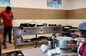 An image of a gascare professional installing an LPG pipe line in a workplace commercial kitchen