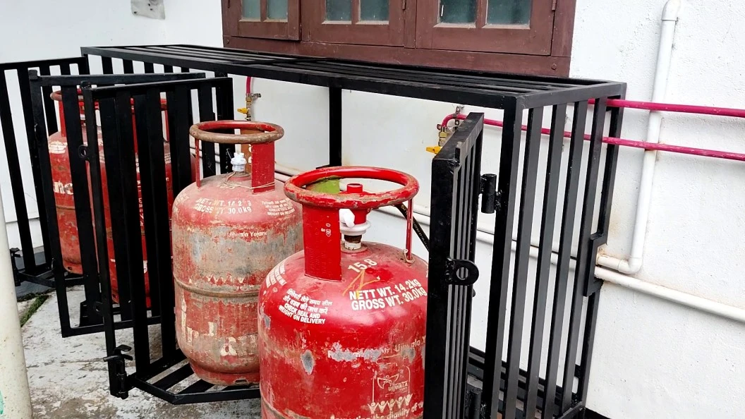 gas cylinders inside gas cage outdoors