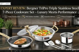 Featured banner image for an authentic expert review of the Bergner TriPro 7-Piece Triply Stainless Steel Cookware Set with PVD Coated Golden Handles, showing a Kadai with a stir-fry, a Frypan with seared chicken, a Saucepan, and three stainless steel tools in a luxury modern kitchen setting. Text overlays highlight the expert review status, verified authentic review badge, and detailed feature icons for triply construction, induction bottom, and complete 7-piece set composition, and www.gascare.in