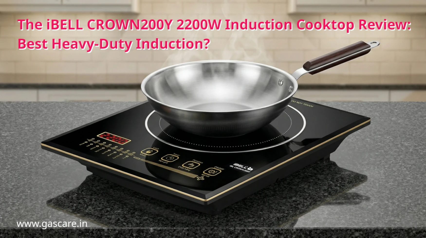 A detailed product review shot of the iBELL CROWN200Y 2200W Induction Cooktop, highlighting its sleek crystal glass surface with a stainless steel wok placed on the heating zone. Text on the image: iBELL CROWN200Y 2200W Induction Cooktop Review: Best Heavy-Duty Induction?, and in left bottom corner: www.gascare.in