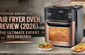 A hero image featuring a sleek, copper and matte black Prestige AirChef 12L Air Fryer Oven actively roasting a whole chicken on a marble kitchen counter, with surrounding plates of crispy chicken tenders and French fries, for a 2026 expert breakdown review. The branding www.gascare.in appears in the lower left corner.