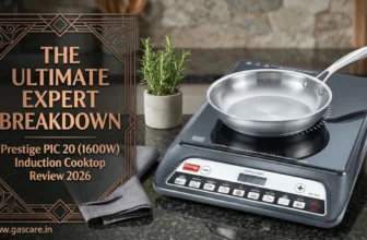 A hero image for the Prestige PIC 20 (1600W) Induction Cooktop review, featuring a steaming stainless steel pan on the black glass surface of a Prestige PIC 20 Induction Cooktop in a modern kitchen setting, with a stylized dark wood panel displaying the large gold text "THE ULTIMATE EXPERT BREAKDOWN" and "INDUCTION COOKTOP REVIEW 2026", www.gascare.in branding on bottom left corner.